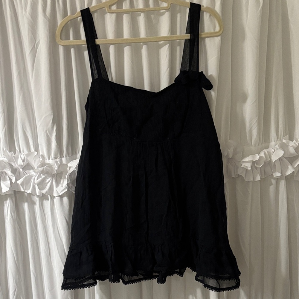 Black Sleeveless Ruffle-Hem Women's Top